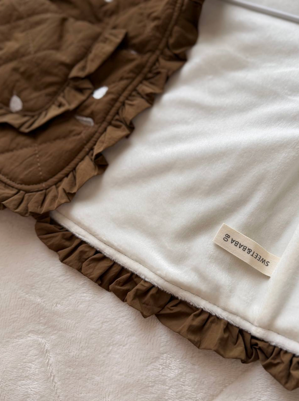 Quilted Insulated Ruffle Vest