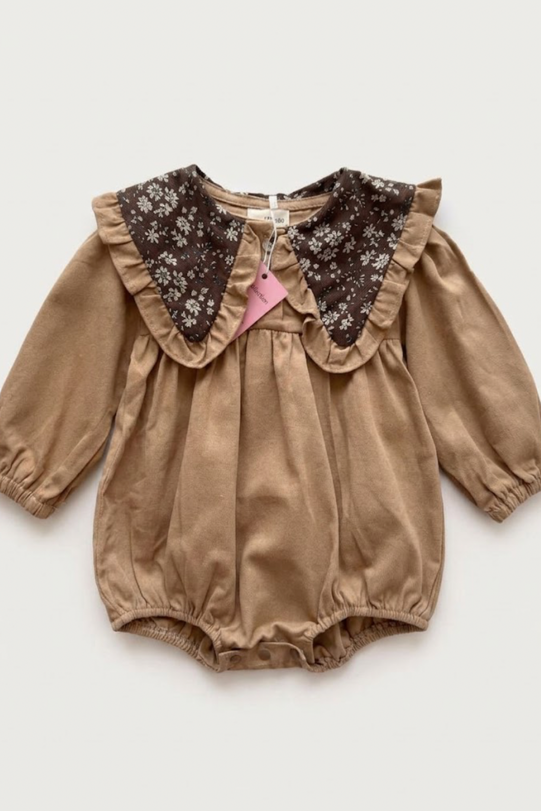 Brown baby romper with a floral print and collar